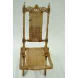 An early 20th century folding chair, pos