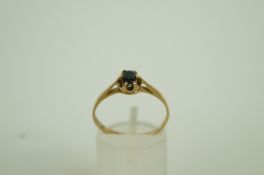 A sapphire single stone 9ct gold ring, f