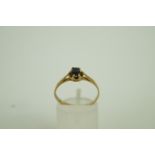 A sapphire single stone 9ct gold ring, f