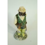 A Beswick fisherman otter (Beatrix Potte