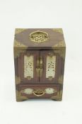 An oriental hardwood jewellery box inlai