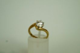 A single stone 9ct gold ring, set with a