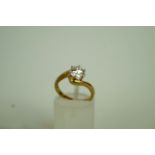 A single stone 9ct gold ring, set with a