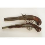 Two reproduction flintlock pistols