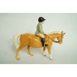 A Beswick jockey on a horse