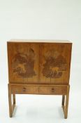 A Rowley gallery two door cabinet with m
