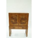 A Rowley gallery two door cabinet with m