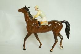 A Beswick racehorse and jockey figure, s