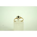 A sapphire and cubic zirconia 9ct gold c