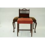 A mahogany stool with inlaid needlework,