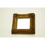 A decorative gilt framed mirror