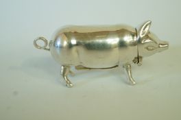 A silver vesta case in the form of a pig
