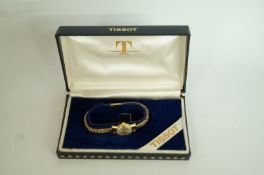 Tissot, a lady's 18 carat gold wrist wat
