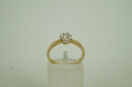 A diamond single stone 9ct gold ring, th