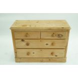 A pine chest of drawers, H 75cm, W 105cm