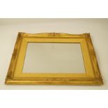 A large decorative gilt framed mirror