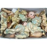 A large collection of various dolls incl