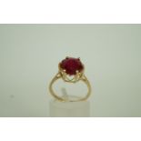 A single stone ruby 9ct gold ring, finge