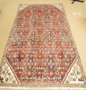 A Hamadan rug in a multi-colour design,