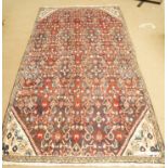 A Hamadan rug in a multi-colour design,