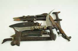 A collection of military knives etc