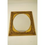 A decorative gilt mirror