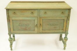 A 20th century oak painted sideboard