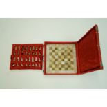 A cased marble chess set