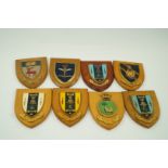 Eight military regimental shield plaques