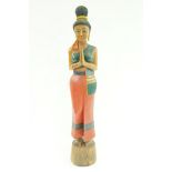 A large wooden model statue of a lady, 1