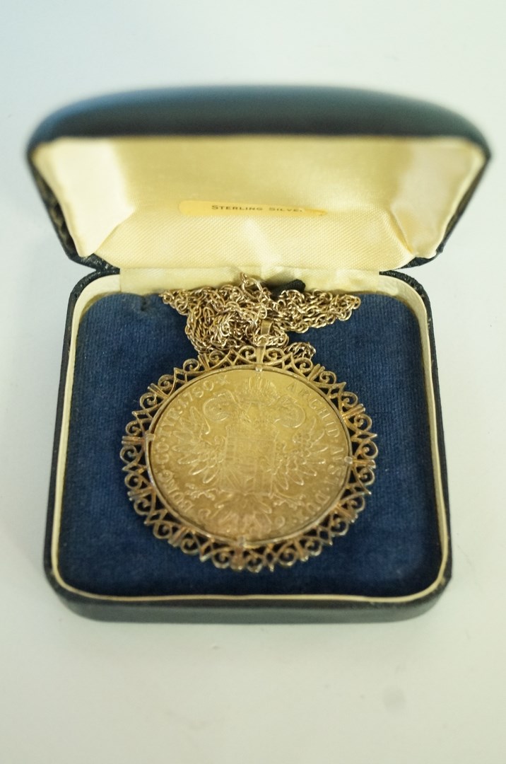 A Maria Theresa coin, in a pendant mount