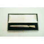 A parcel gilt silver paper knife, London