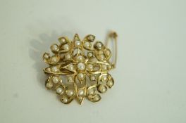 An Edwardian seed pearl pendant brooch,