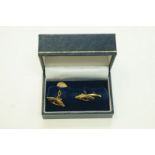 A pair of modern 9ct gold horse head cuf