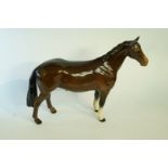A Beswick brown standing horse