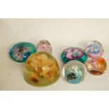 A collection of seven paperweights inclu