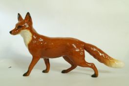 A Beswick long tailed fox