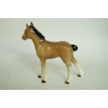 A Beswick style light brown foal