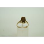 A single stone smokey quartz 9ct gold ri