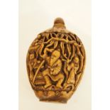 An oriental carved stone scent bottle