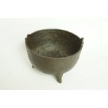 An antique iron cauldron