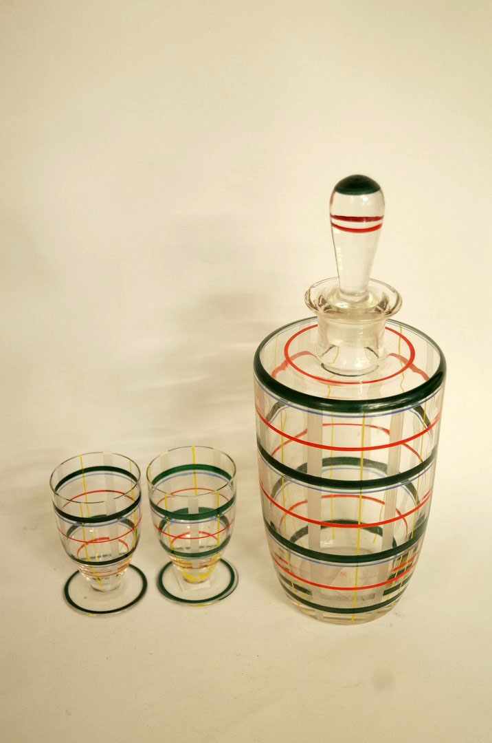 An Art Deco painted decanter, and two ma
