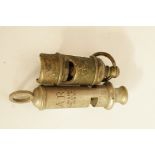 A WWII ARP whistle and one other whistle