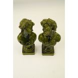 A pair of green glaze busts of Bacchus a