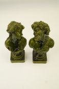 A pair of green glaze busts of Bacchus a