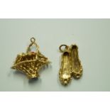 A 9 carat gold basket of flowers charm;