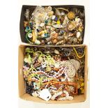 A large collection of costume jewellery, mainly bead necklaces, some thimbles in various materials,