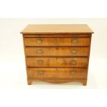 A George III mahogany chest of four graduated drawers with brushing slide, H 97cm W 110cm D 59.5cm