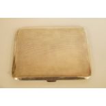 A silver cigarette case, Birmingham 1912, 155.5 grams