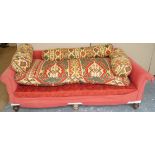 A Victorian sofa on turned legs, W 217cm D 101cm